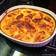 Scalloped potatoes in a casserole dish.