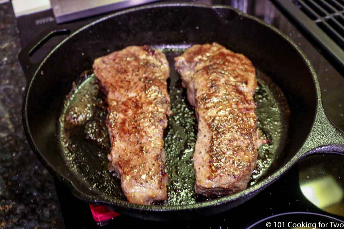 https://www.101cookingfortwo.com/wp-content/uploads/2020/08/finished-steaks-in-a-black-skillet.jpg