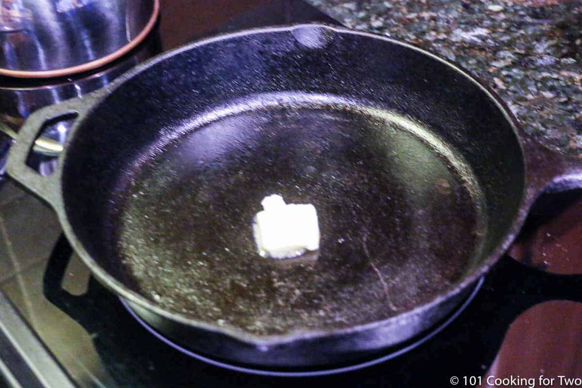 pat of butter in a cast iron skillet.