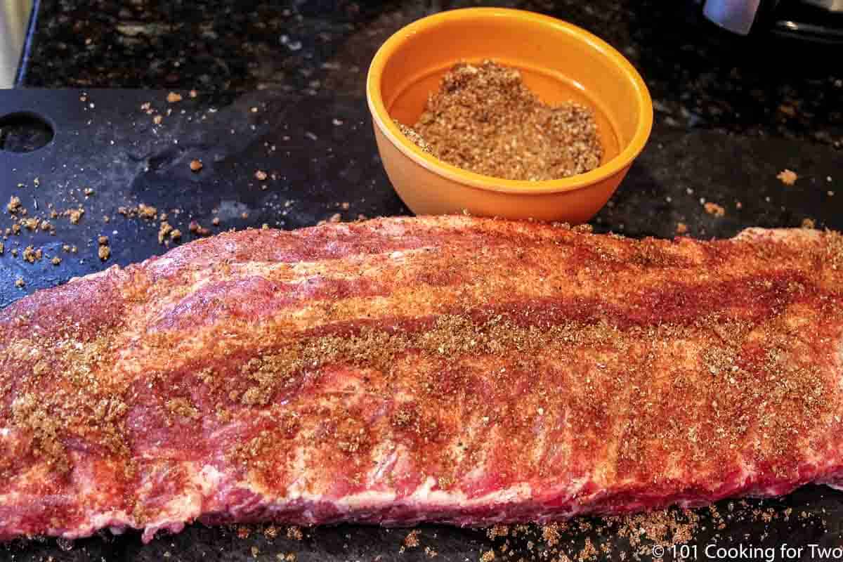 https://www.101cookingfortwo.com/wp-content/uploads/2022/01/dry-rub-applied-to-baby-back-ribs.jpg