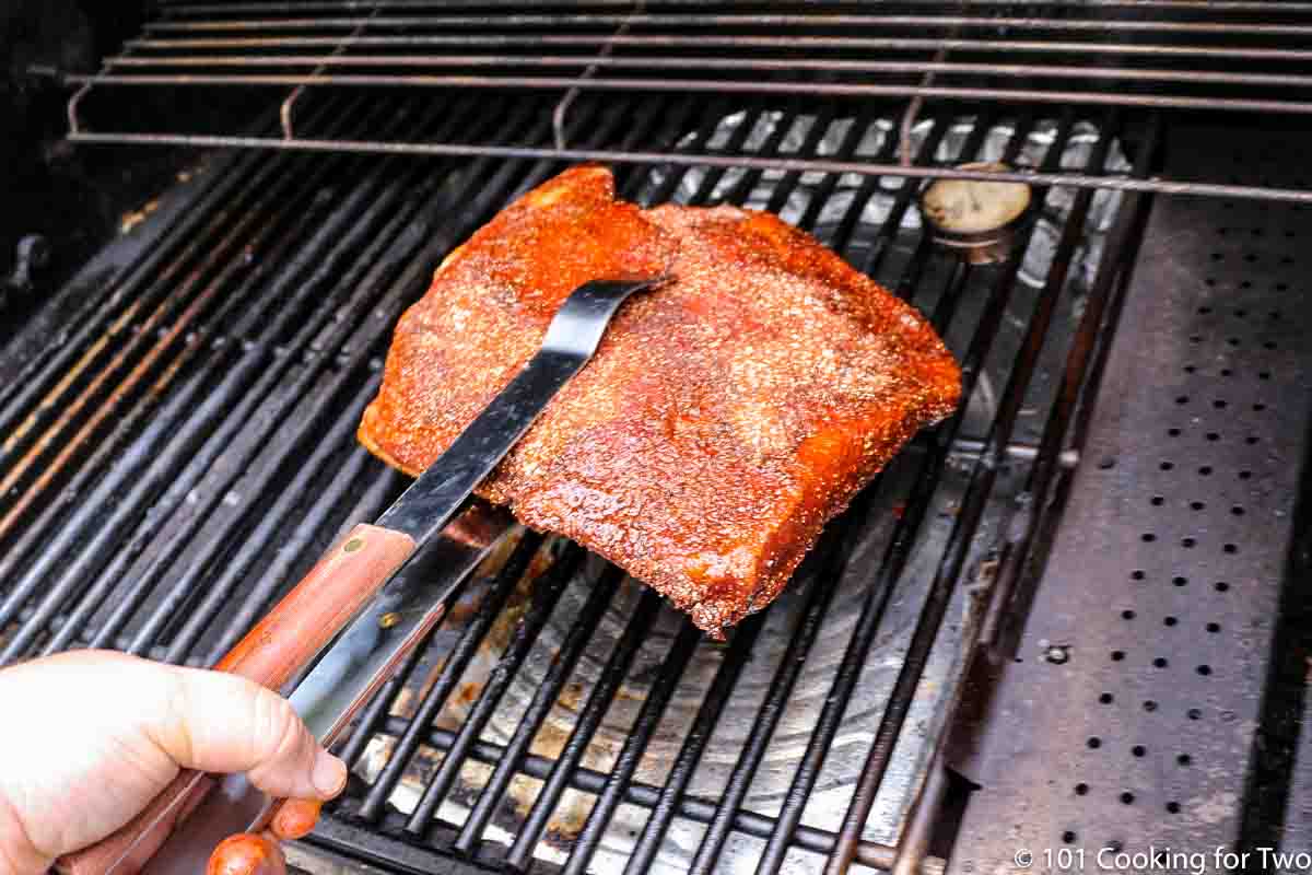 https://www.101cookingfortwo.com/wp-content/uploads/2023/03/placing-brisket-on-indirect-side-of-the-grill.jpg