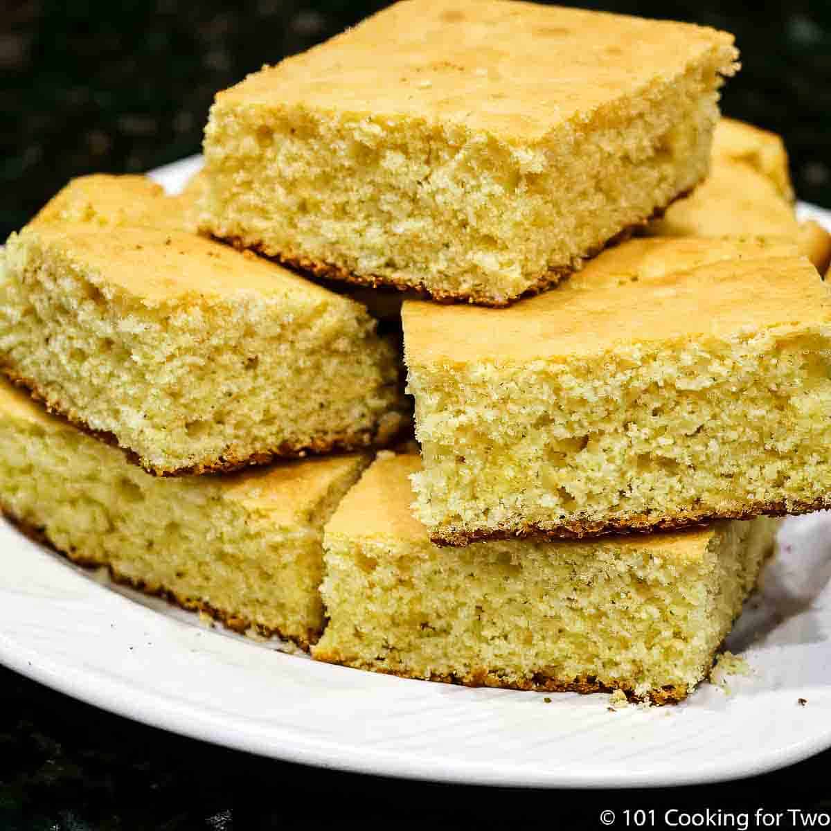 https://www.101cookingfortwo.com/wp-content/uploads/2023/09/pile-of-cornbread-on-a-plate-2.jpg