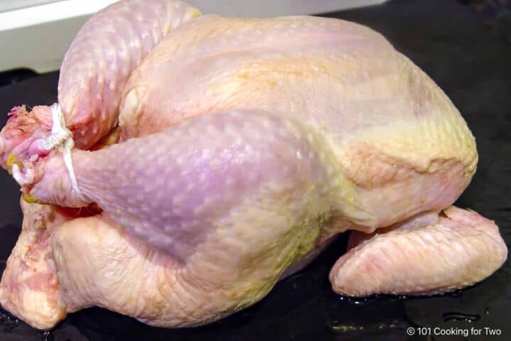 a whole raw chicken.