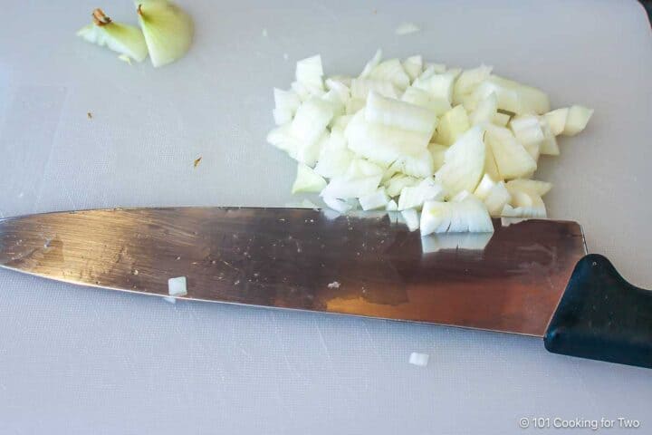 chopped onion on a cutting board.