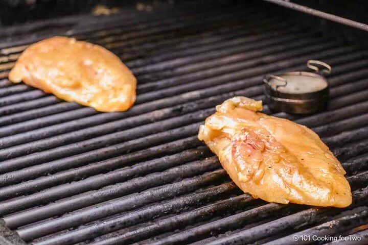 glazed chicken breasts on the grill.