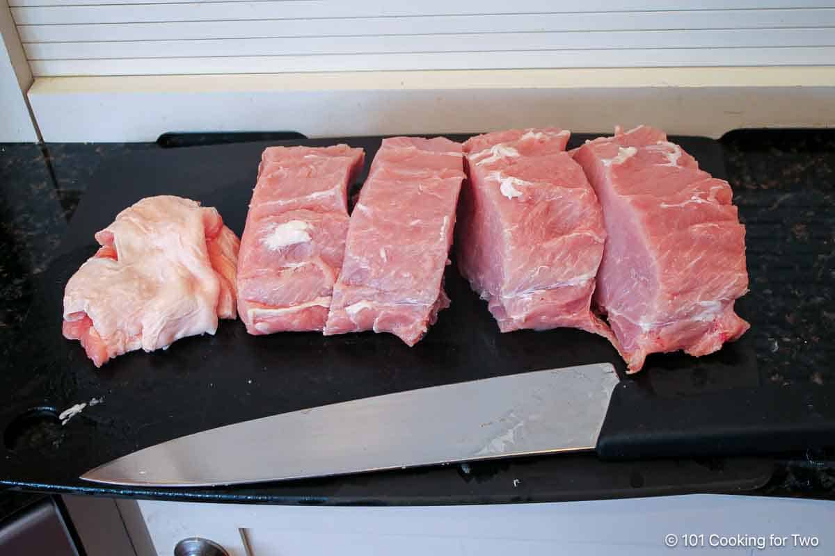 trim and slice pork loin.