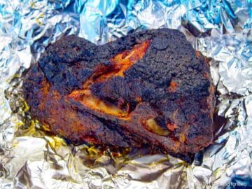 grilled pork butt in foil.