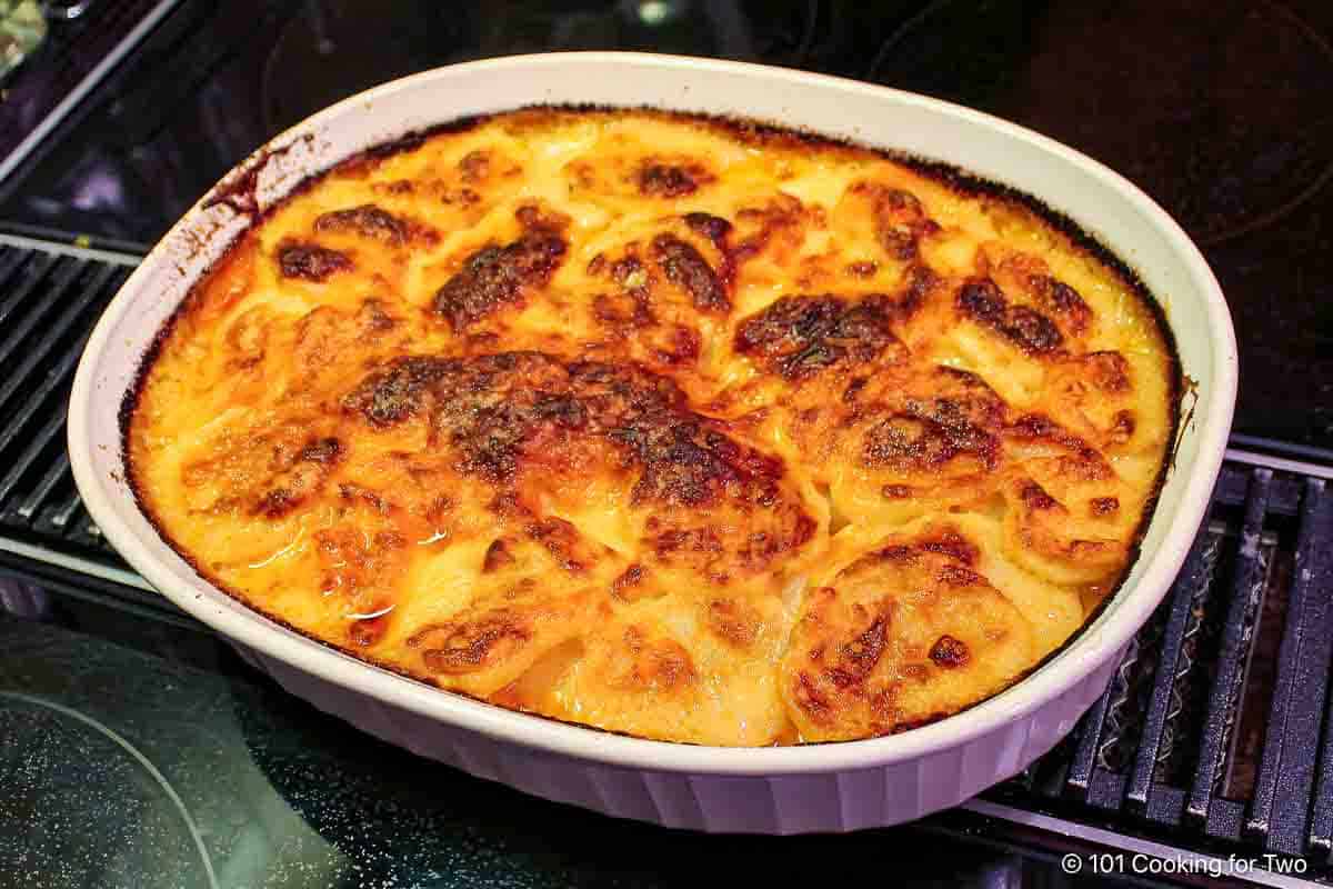 Scalloped potatoes in a 2 quart dish.