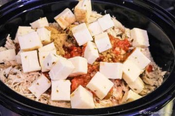 all the ingredients in the crock pot ready to mix.