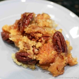 Apple cobbler on a gray plate.