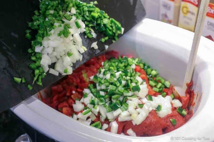 Adding all ingredients to the pot.