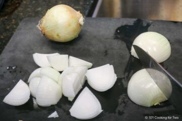 Chopping onions into petals.