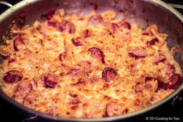 Brown the casserole under a broiler.