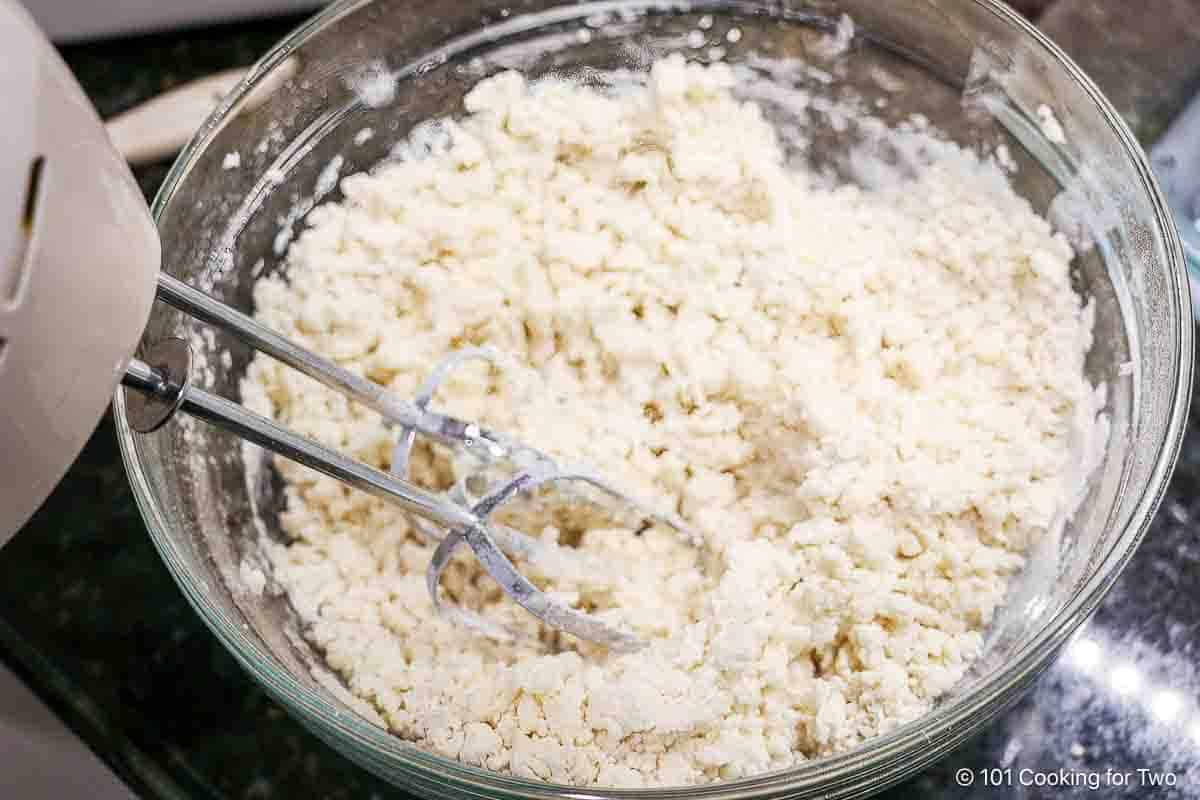 Mixing shortbread crust.