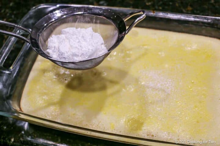 Shake powdered sugar into lemon bars before baking.