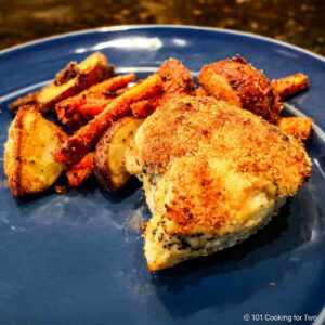 Breaded chicken breasts with potatoes.