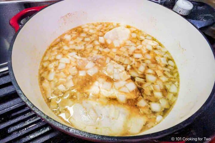 Chicken in the braising fluid.