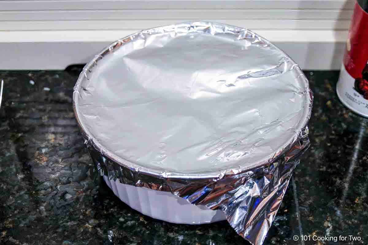 Seal the baking dish with foil.