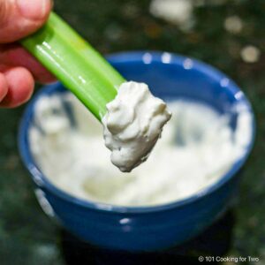 Blue cheese dip on celery.