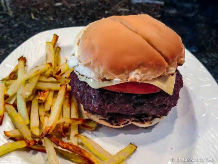 Burger with fries.