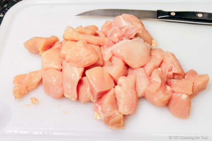 Cubes of trimmed chicken breast.