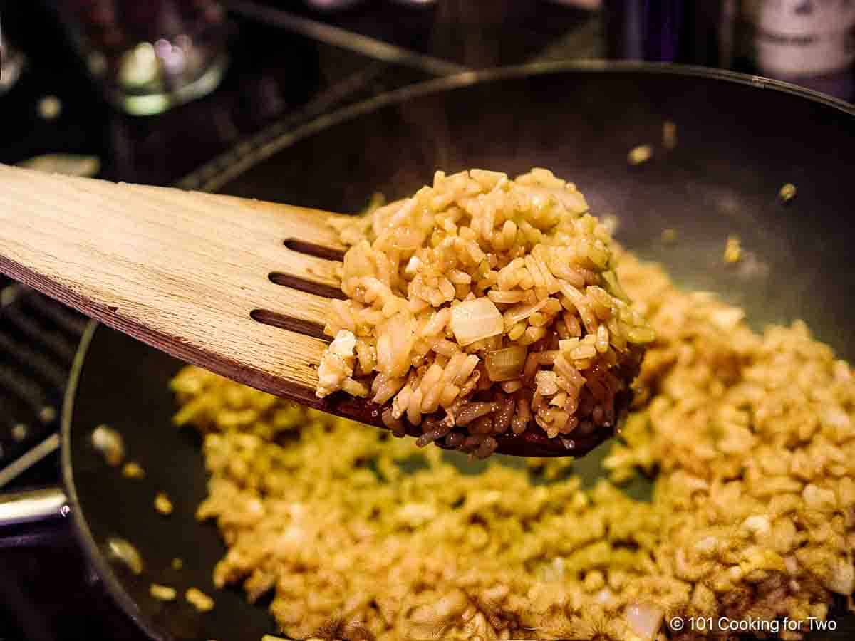 Fried rice on a spatula.