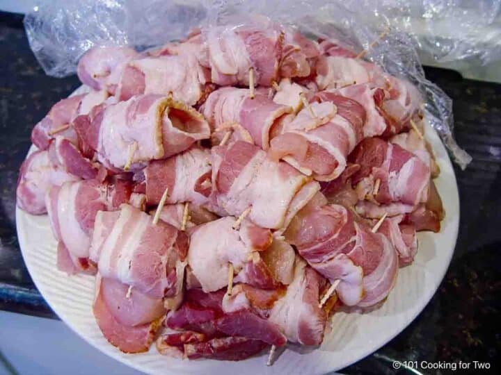 Pile of bacon and chicken wraps.