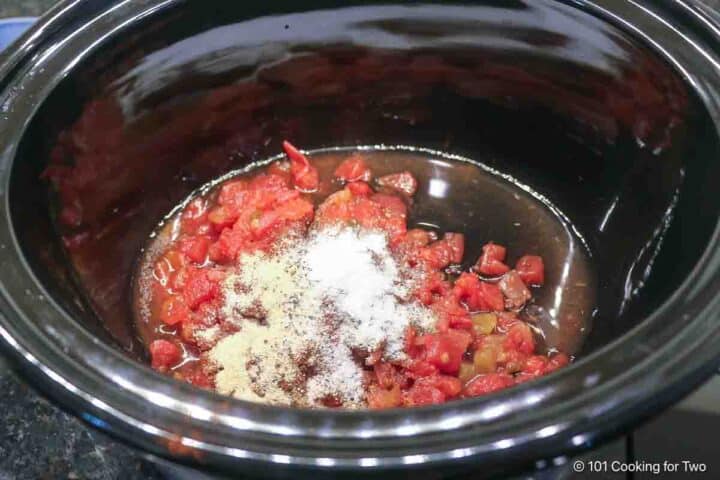 salsa and spices in a small crock pot.