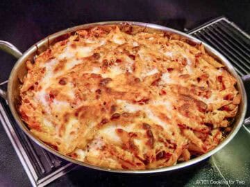 Golden brown pasta and sausage bake.