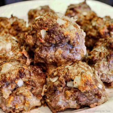 Pile of meatballs on a plate.