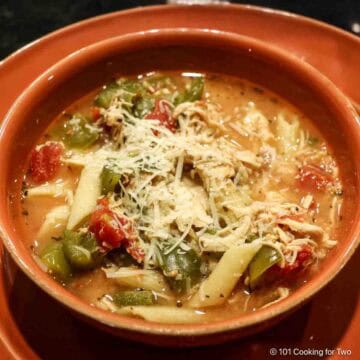 Bowl of chicken parm soup.