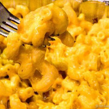 Browned fried mac and cheese on a fork.